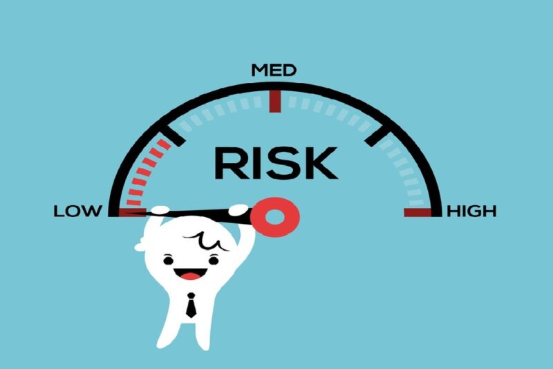 How do mutual funds help manage risk?